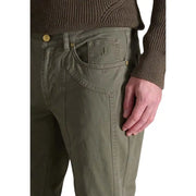 Jeckerson men fall winter olive green denim jeans with gold-tone button and stitching details in cotton elastane