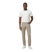 Jean en denim beige slim-fit avec une coupe classique à cinq poches et des surpiqûres blanches, confectionné en piqué de coton mélangé par Jeckerson