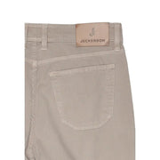 velours côtelé beige jeckerson Pantalon homme en piqué de coton mélangé avec écusson de marque en cuir beige à la taille.