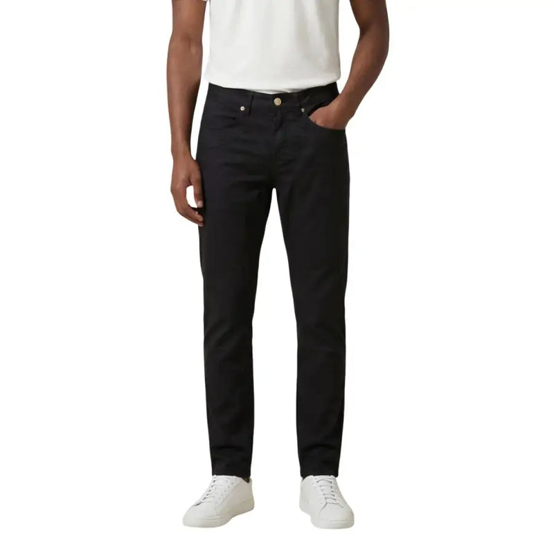 Jeckerson Jean slim noir pour homme, coupe classique à cinq poches et finitions dorées.