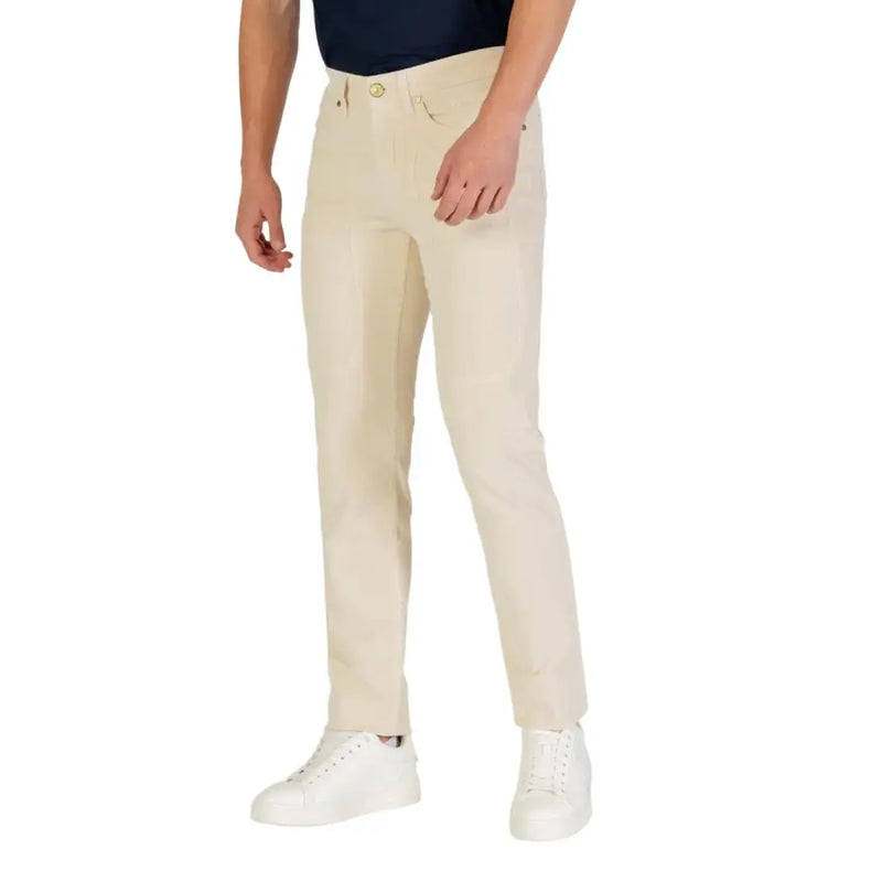 Beige slim-fit chino pants with button fly and pockets, likely made of cotton or polyester blend.