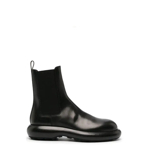 Bottines Chelsea pour homme en cuir noir Jil Sander, avec semelle épaisse brillante et empiècements élastiques sur les côtés, collection automne-hiver