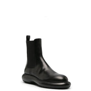 Jil Sander men black leather ankle boot with chunky sole and elastic side panels from fall winter collection