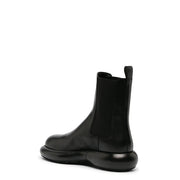 Jil Sander men black leather chelsea ankle boot with chunky glossy rubber sole and elastic side panels fall winter collection