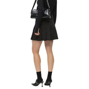 Black leather crossbody bag with silver hardware and branded strap shown with Karl Lagerfeld Jeans black zip skirt