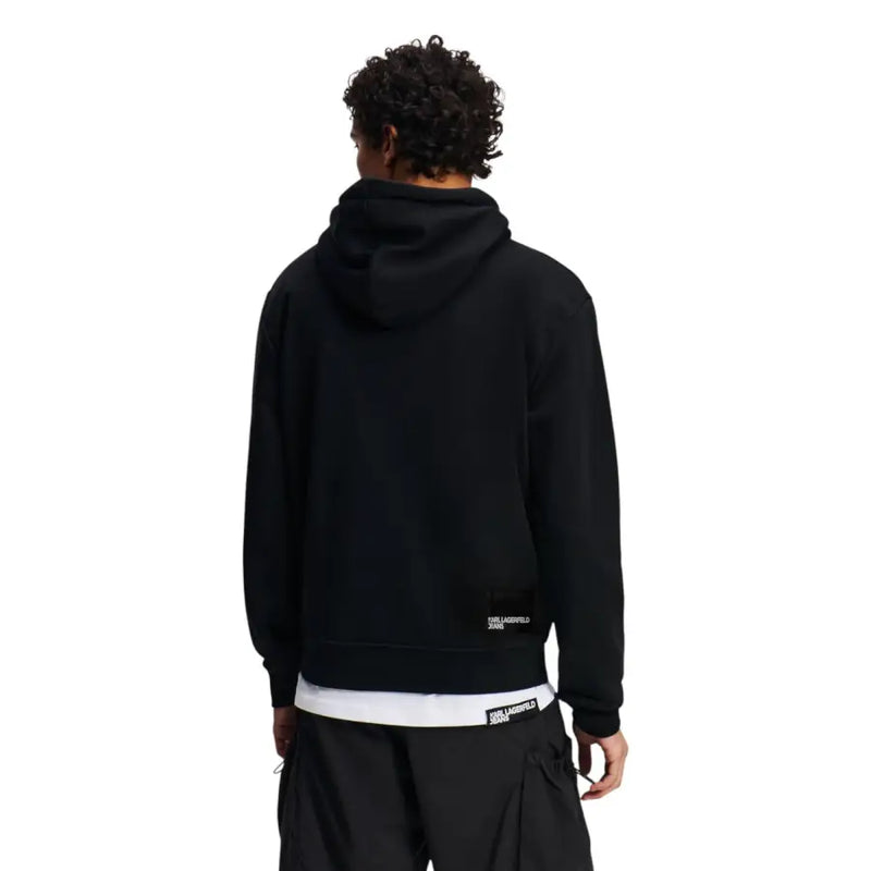 Black karl lagerfeld jeans men’s long sleeve hoodie with subtle logo patch on lower back and branded hem shown from back