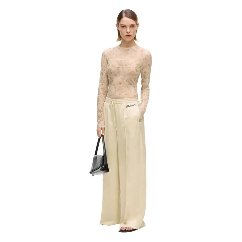 Karl lagerfeld Jean femme beige à jambes larges en satin, finition élégante et logo discret à la taille.