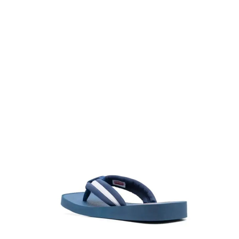 Tongs bleues Kenzo pour homme avec brides en caoutchouc rayées blanches et marine, idéales pour une tenue décontractée.