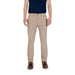 Khaki-colored men’s casual pants paired with brown boat shoes for a stylish look