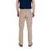 Khaki-colored men’s casual pants with brown boat shoes displayed for fashion styling