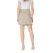 Women’s beige and khaki mini skirt displayed in a stylish fashion showroom
