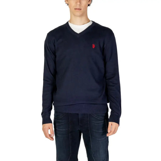 Navy blue v-neck sweater with red and white logo, u.s.