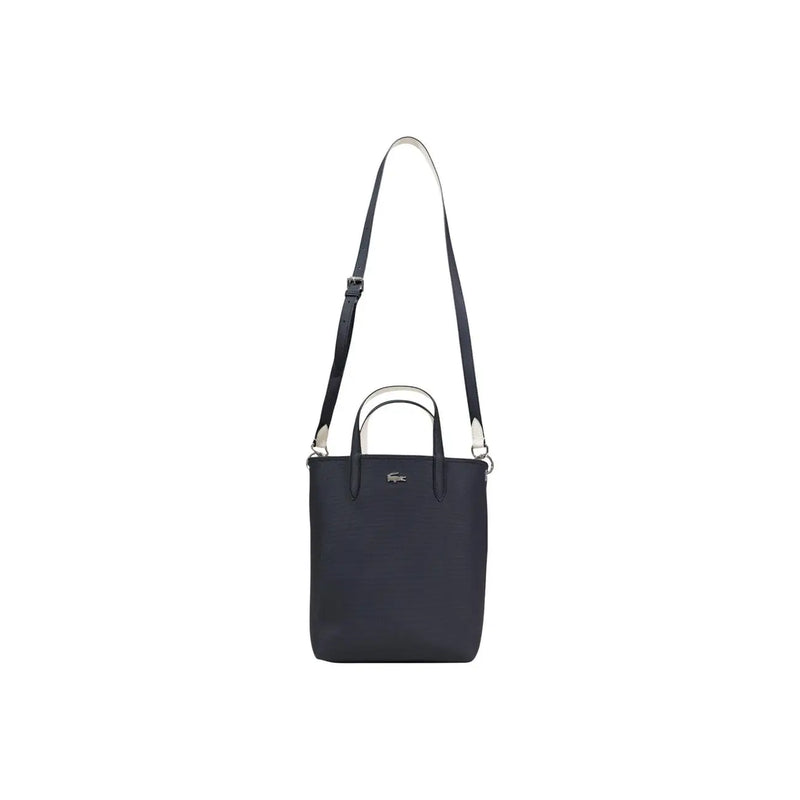 Lacoste black zip handbag tote bag with silver-tone hardware and contrasting white shoulder strap and inner pouch