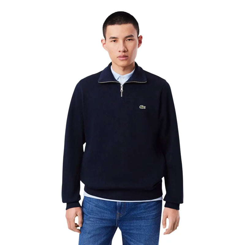 Pull Lacoste bleu marine en coton pour homme, demi-zip, avec logo crocodile vert discret sur la poitrine