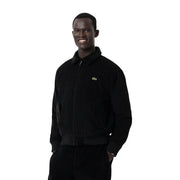 Blouson bomber Lacoste pour homme en velours côtelé noir avec logo crocodile vert sur la poitrine gauche, style blazer classique en coton