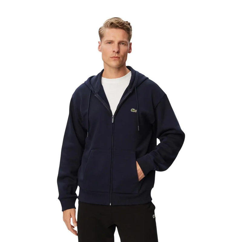 Sweat à capuche zippé Lacoste pour homme en coton bleu marine, orné d'un petit logo crocodile brodé sur la poitrine gauche.