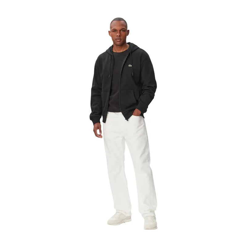 Sweat à capuche Lacoste pour homme, en coton noir, fermeture éclair sur le devant et logo crocodile vert discret sur la poitrine.