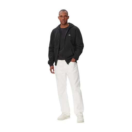 Sweat à capuche Lacoste pour homme, en coton noir, fermeture éclair sur le devant et logo crocodile vert discret sur la poitrine.