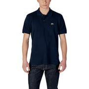 Polo Lacoste bleu marine pour homme, orné d'un petit logo crocodile vert, en coton à manches courtes.