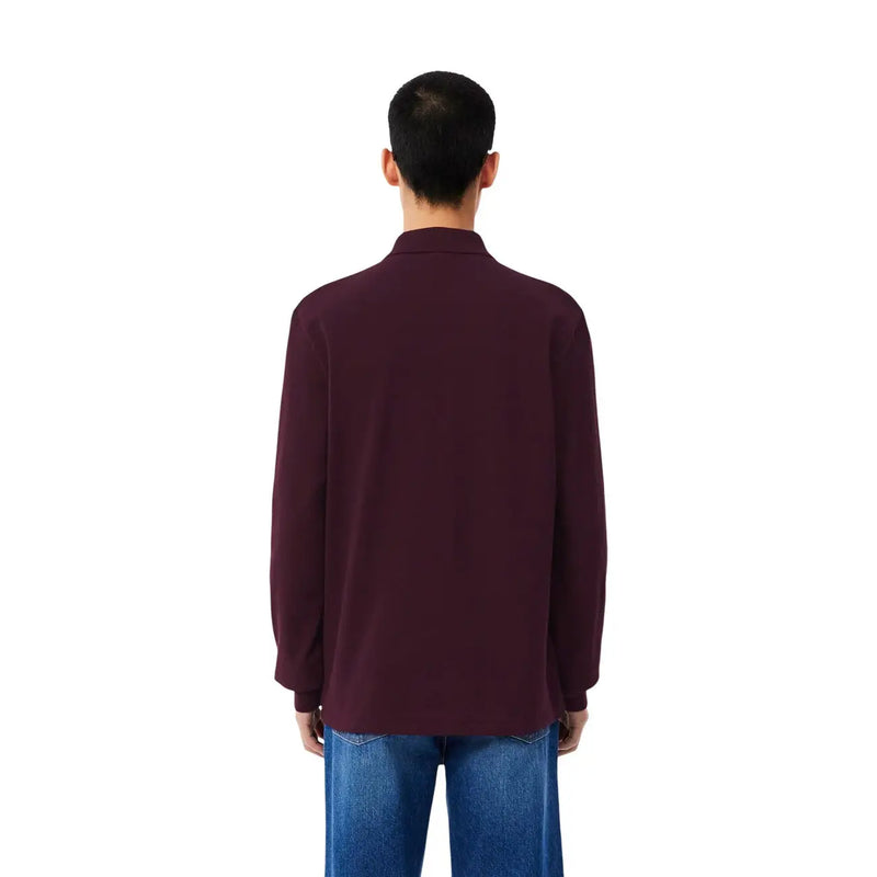 Polo Lacoste pour homme, violet, en coton, manches longues, col classique et tissu uni lisse.