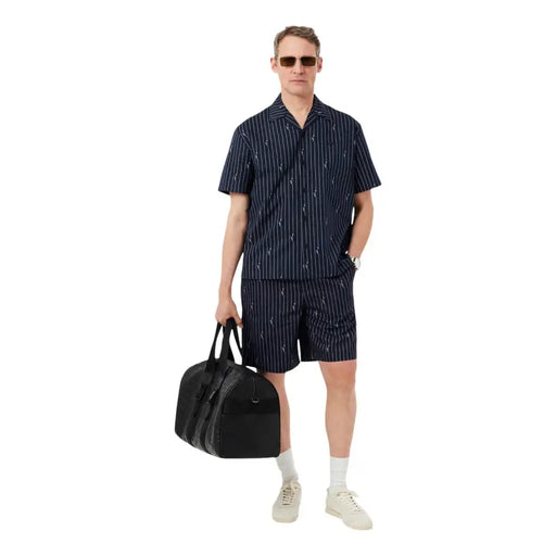 Sac de sport noir texturé avec top Poignées et fermeture éclair avant ornées du logo Lacoste pour homme