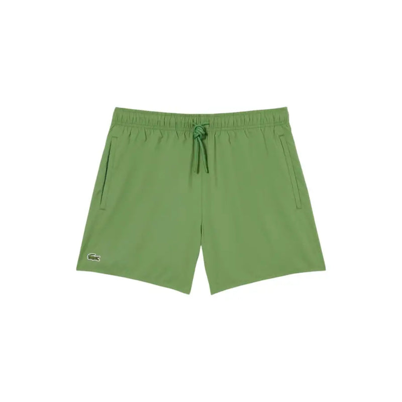 Short de bain Lacoste vert pour homme, avec taille élastique et cordon de serrage, en polyester, conçu pour la baignade.