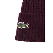 Casquette Lacoste pour homme en laine côtelée bordeaux, ornée d'un crocodile vert et de détails blancs et rouges, vue de face