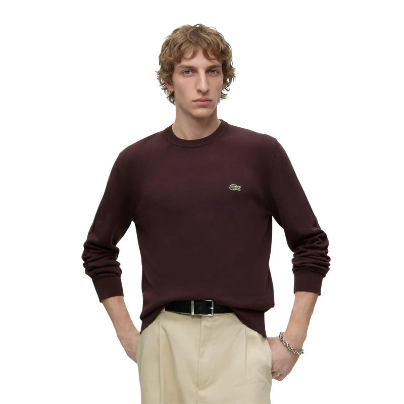 Pull Lacoste en laine bordeaux pour homme, avec logo crocodile brodé sur la poitrine gauche, vue de face