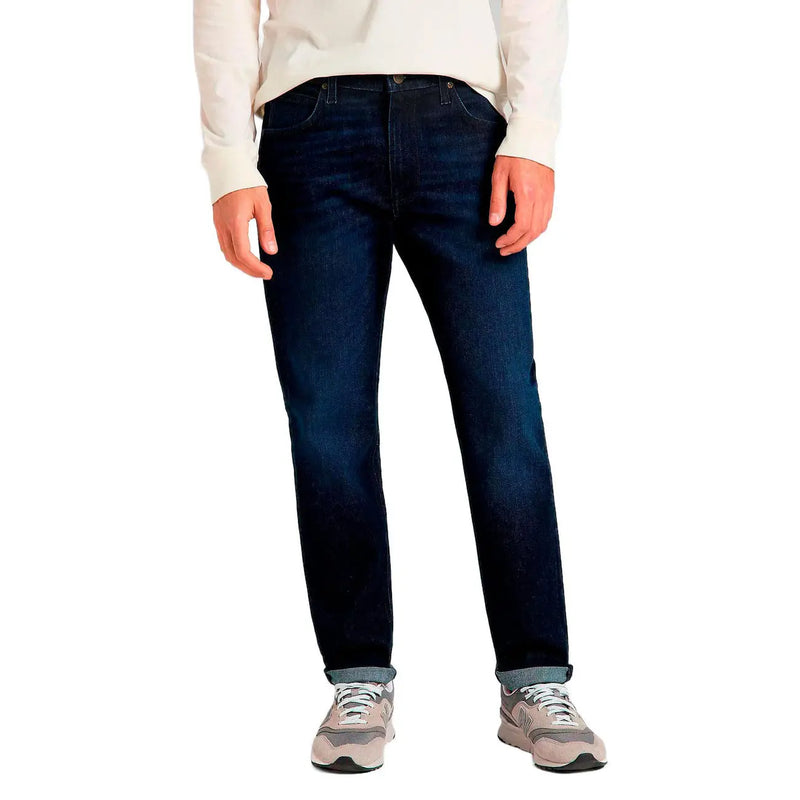 Lee Men’s Austin blue jeans in dark indigo denim with classic straight-leg cut and rolled cuffs featuring pockets