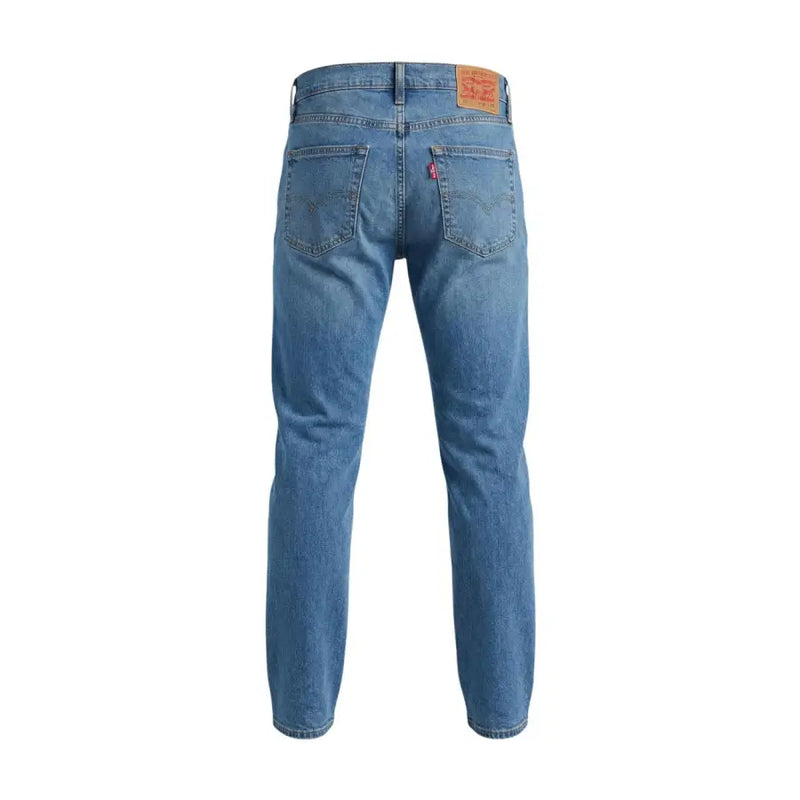 Jean Levi's pour homme en denim bleu, coupe slim classique à cinq poches, en coton stretch, avec empiècement en cuir à l'arrière.