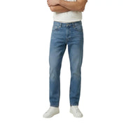 Jean Levi's pour homme en denim bleu, coupe slim, en coton stretch, délavage moyen classique, jambes droites et poches avant standard.