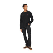 T-shirt Levi's pour homme, noir, en coton, à manches longues et col rond. t-shirt avec un petit logo rouge sur la poitrine gauche