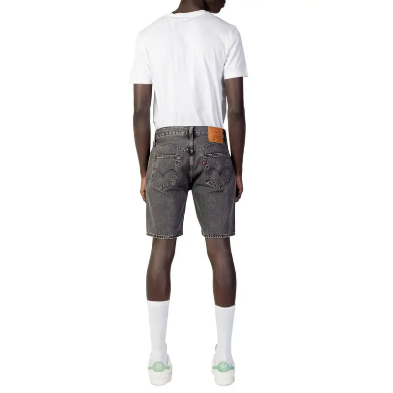 Back side of levis men’s black cotton shorts featuring dark gray denim with classic levi’s pocket and orange leather patch