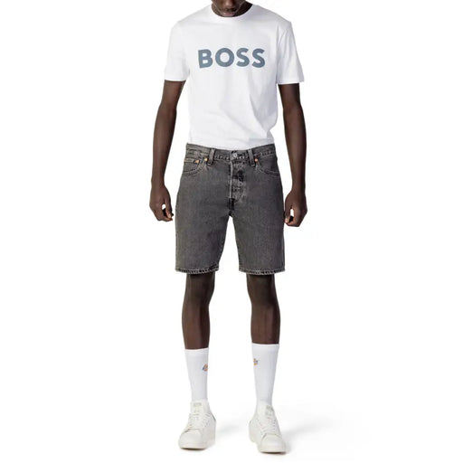 Levis men’s black cotton shorts paired with a white boss t-shirt featuring a gray logo for spring and summer