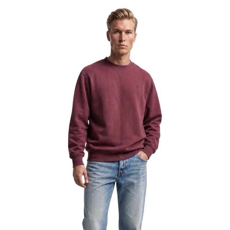 Sweat-shirt Levi's pour homme, en coton bordeaux, avec un logo discret sur la poitrine et un col rond.
