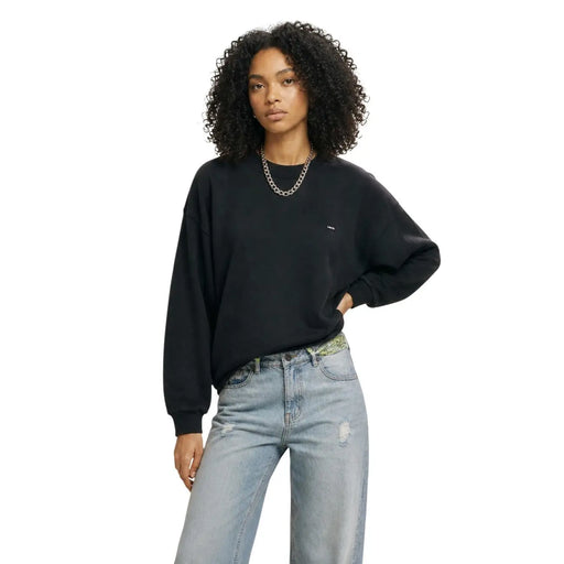 Sweat-shirt Levi's noir en coton pour femme, coupe oversize, col rond, avec un petit logo brodé sur la poitrine gauche.