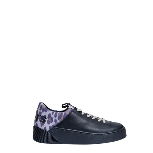 Levi’s women’s black leather sneakers shown from back with purple and gray leopard print accent on heel tab