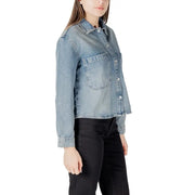 Light blue denim button-up shirt with two front pockets, part of the Light Blue Cotton Blouse collection