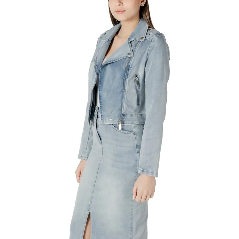 Light blue cotton moto jacket with light-wash denim texture and silver zippers and button details