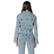 Light blue denim jumpsuit in light-wash denim with a tailored fit and classic back seam design shown from the back