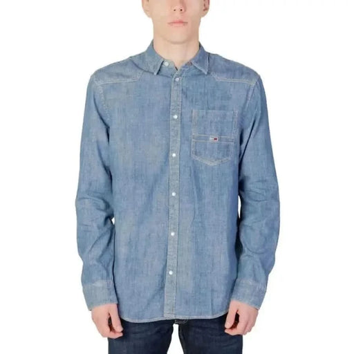 Light blue denim button-up shirt with chest pocket and Tommy Hilfiger logo for men