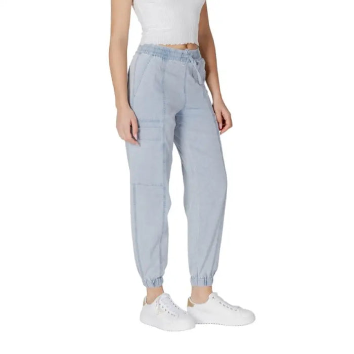 Light blue drawstring jogger pants displayed in a product image
