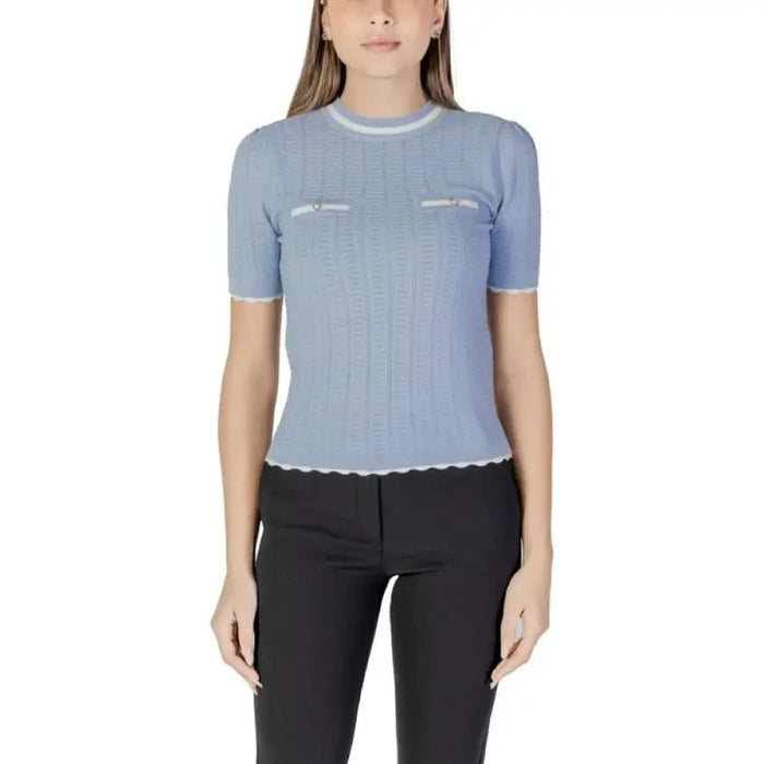 Light blue knit top with white trim from Morgan De Toi Women’s Plain White T-Shirt