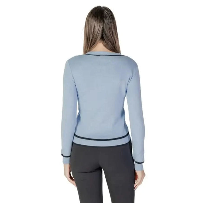 Light blue long-sleeved Morgan De Toi women’s knit sweater with buttons and pockets