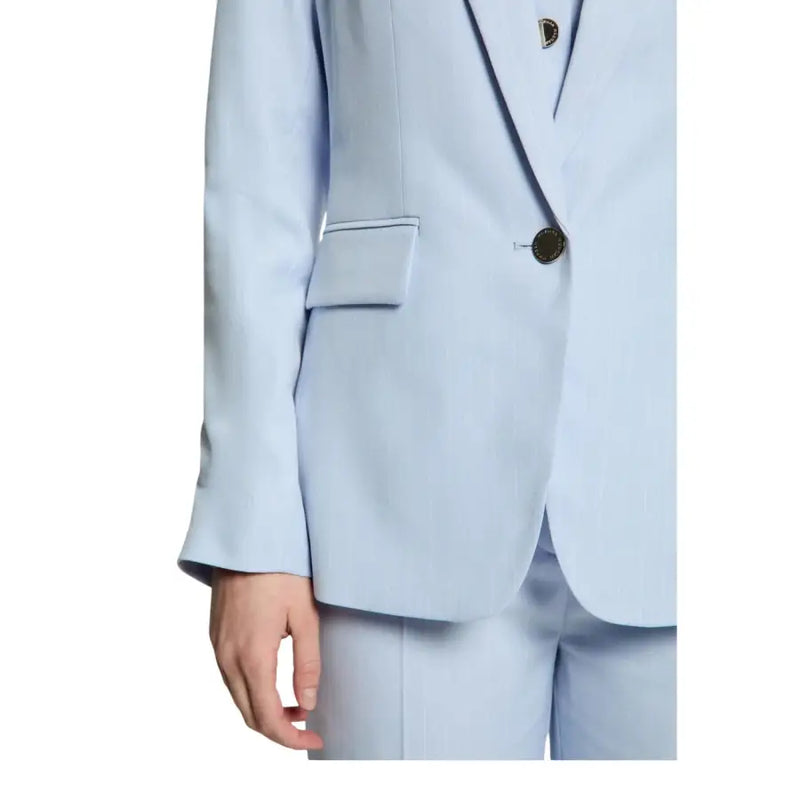 Blazer femme bleu clair à fines rayures, boutons et col à revers marron foncé