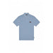 Light blue polo shirt from the White Polo Shirt Collection displayed in the image