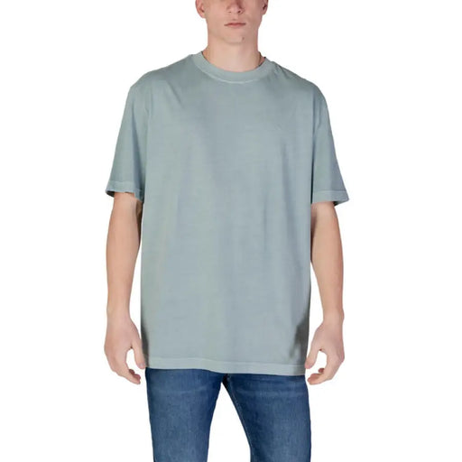 Light blue short-sleeved t-shirt from Calvin Klein Jeans for men with green print design