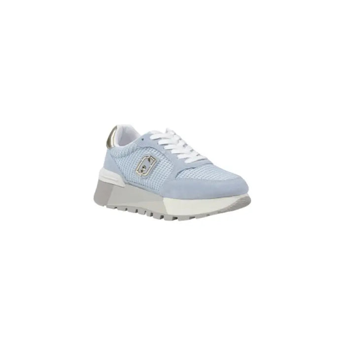 Light blue women’s sneaker with silver accents displayed in the product image