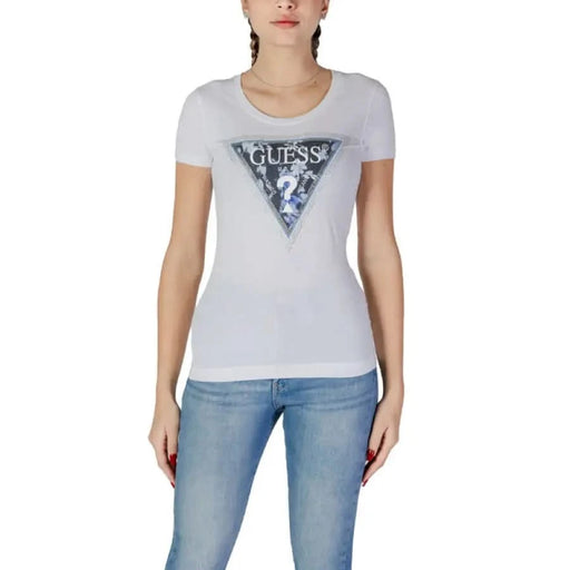 Light gray GUESS t-shirt featuring a triangular logo design for women’s fashion
