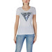 Light gray GUESS t-shirt featuring a triangular logo design for women’s fashion